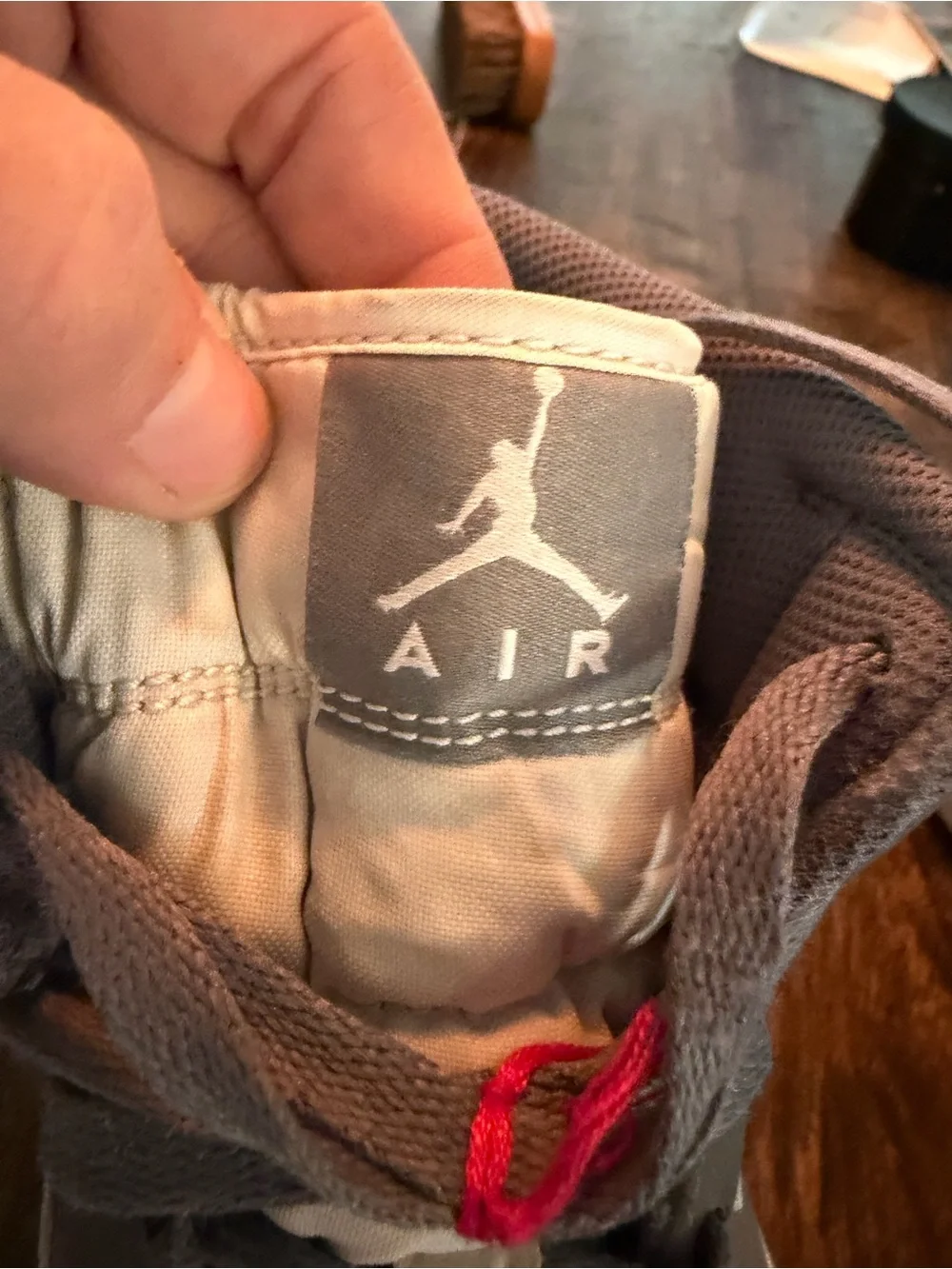 Jordan Gray and White High-Top Sneaker with Wing Logo